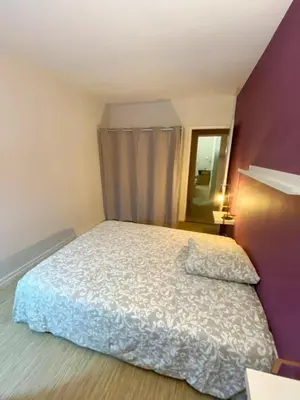 Un ou plusieurs lits dans un hébergement de l'établissement Alcove, 4 Chambres - Proche tram - Centre Nantes