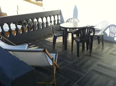 Coin salon dans l'établissement Les Appartements du 104
