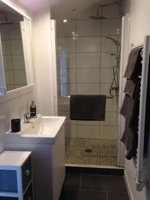 Salle de bains dans l'établissement Les Appartements du 104