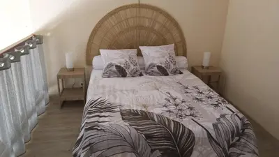 Un ou plusieurs lits dans un hébergement de l'établissement Bel appartement à 100m de la plage avec parking privé
