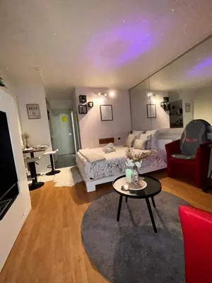 Coin salon dans l'établissement Les temps Heureux