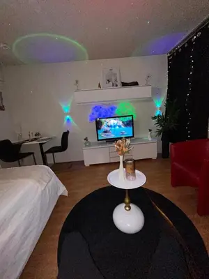 Télévision ou salle de divertissement dans l'établissement Évasion Nuageuse