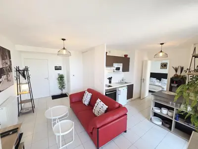 Cuisine ou kitchenette dans l'établissement Charmant T2 avec grande terrasse