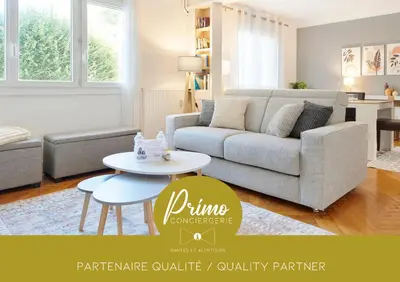 Coin salon dans l'établissement Les Capucines - Appt proche Talensac avec parking