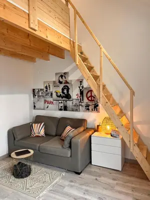 Coin salon dans l'établissement Aux Pas Sages, 4 logements mitoyens, proche mer