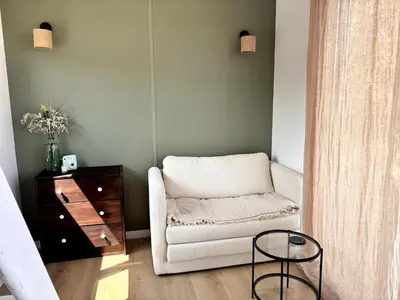 Coin salon dans l'établissement Tiny House cosy