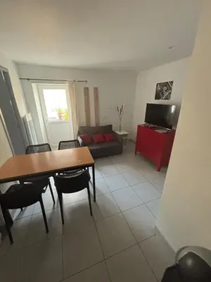 Télévision ou salle de divertissement dans l'établissement Maison de campagne proche D'Angers