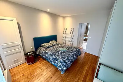 Un ou plusieurs lits dans un hébergement de l'établissement Bright apartment for 4 people in Nantes