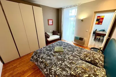 Un ou plusieurs lits dans un hébergement de l'établissement Bright apartment for 4 people in Nantes