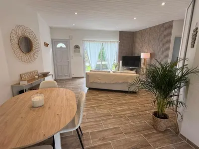 Un ou plusieurs lits dans un hébergement de l'établissement charmante maison