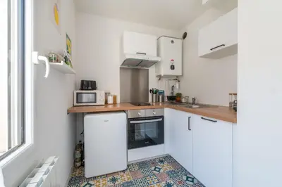 Cuisine ou kitchenette dans l'établissement L'Evain - 800m centre - 850m gare