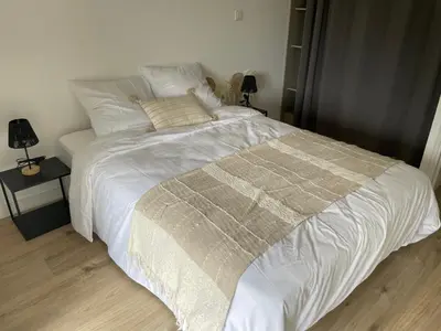 Un ou plusieurs lits dans un hébergement de l'établissement Maison en campagne