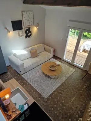 Coin salon dans l'établissement Studio chaleureux de 30m2