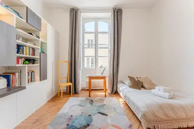 Un ou plusieurs lits dans un hébergement de l'établissement Hélios - Élégant appartement de 115 m² à Nantes