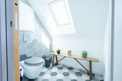 Salle de bains dans l'établissement l'appart Gemmois , climatisé et moderne avec balnéo