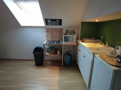 Cuisine ou kitchenette dans l'établissement Studio spacieux équipé à proximité de la Loire