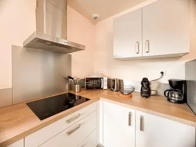 Cuisine ou kitchenette dans l'établissement Maison 5-6 personnes -15 min du Parc - Parking -by R&G