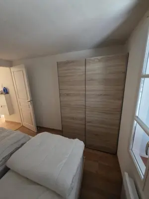Un ou plusieurs lits dans un hébergement de l'établissement Maison plage et golf