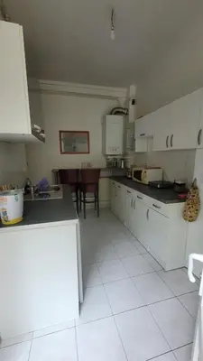 Cuisine ou kitchenette dans l'établissement Appartement centre de Nantes