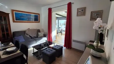 Coin salon dans l'établissement Maison de vacances 6 personnes