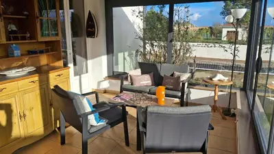 Coin salon dans l'établissement Maison de vacances 6 personnes