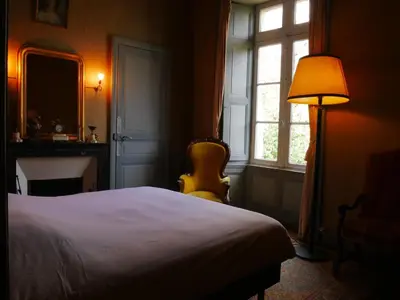 Un ou plusieurs lits dans un hébergement de l'établissement Château de la Garlais - 29 couchages