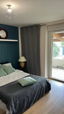 Un ou plusieurs lits dans un hébergement de l'établissement Chez Aurélie & Mathieu studio dans ancienne maison rénovée proche du Lac