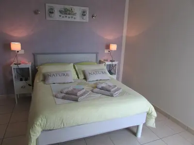 Un ou plusieurs lits dans un hébergement de l'établissement Chambre D'hôtes La Basse Gougeonnière
