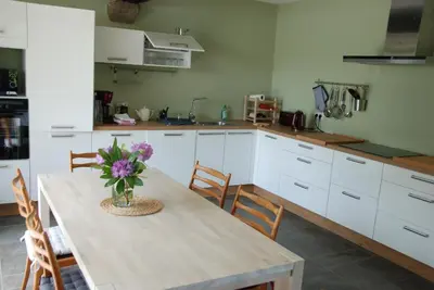 Cuisine ou kitchenette dans l'établissement Le Moulin Moreau