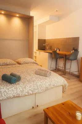 Un ou plusieurs lits dans un hébergement de l'établissement Le Phoenica - Former Hotel - Parking