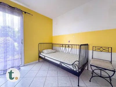 Un ou plusieurs lits dans un hébergement de l'établissement Tranquiloue - Maison Familiale 6 min du Puy du Fou