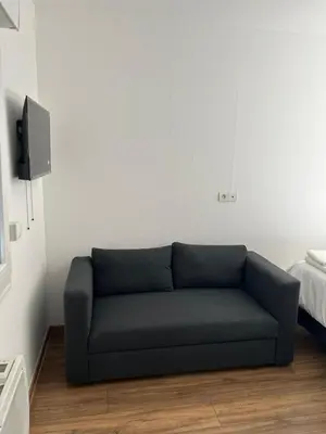 Coin salon dans l'établissement Maison ADAR 101