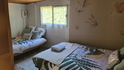 Un ou plusieurs lits dans un hébergement de l'établissement Chambre atypique