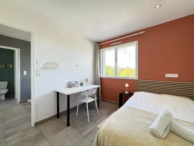 Un ou plusieurs lits dans un hébergement de l'établissement Le Tertre - Wifi Fibre, TV, 2 Parkings, Moderne