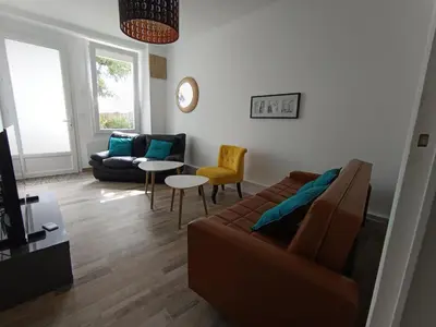 Coin salon dans l'établissement Aux lits de la loire
