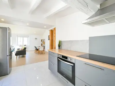Cuisine ou kitchenette dans l'établissement La Maison Céleste Jardin et Charme en hauteur