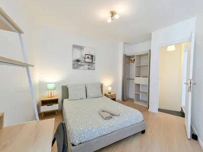 Un ou plusieurs lits dans un hébergement de l'établissement La Maison Céleste Jardin et Charme en hauteur