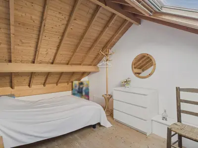 Un ou plusieurs lits dans un hébergement de l'établissement Maison avec accès privatif direct à la plage pour 6