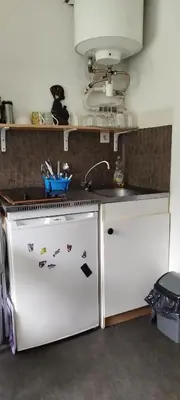 Cuisine ou kitchenette dans l'établissement Studio calme