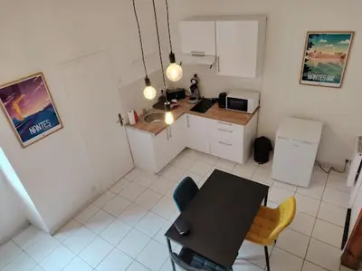 Cuisine ou kitchenette dans l'établissement Le Cocon du Château