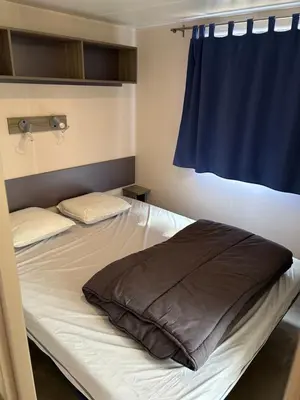 Un ou plusieurs lits dans un hébergement de l'établissement Mobil-home 6 pers proche Puy duFou