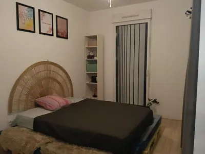 Un ou plusieurs lits dans un hébergement de l'établissement Mina Room