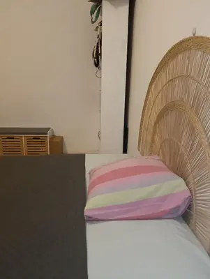 Un ou plusieurs lits dans un hébergement de l'établissement Mina Room