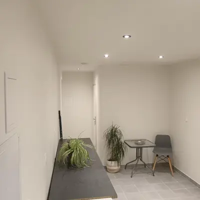 Coin salon dans l'établissement Studio chez l'habitant
