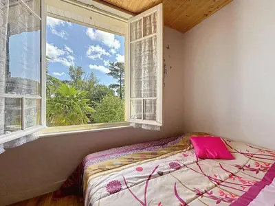 Un ou plusieurs lits dans un hébergement de l'établissement Holiday Home Les Vents Doux by Interhome
