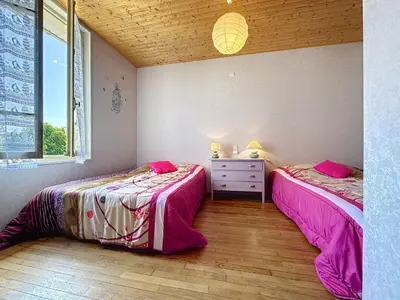 Un ou plusieurs lits dans un hébergement de l'établissement Holiday Home Les Vents Doux by Interhome