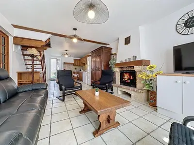 Coin salon dans l'établissement Holiday Home Les Dunes by Interhome