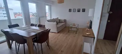 Coin salon dans l'établissement Appartement lumineux et cosy