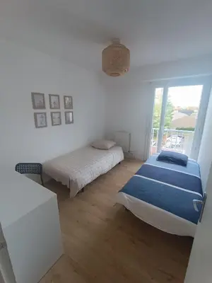 Un ou plusieurs lits dans un hébergement de l'établissement Appartement lumineux et cosy