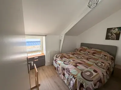 Un ou plusieurs lits dans un hébergement de l'établissement Comme à la maison